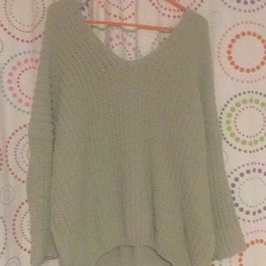 A pols light green sweater